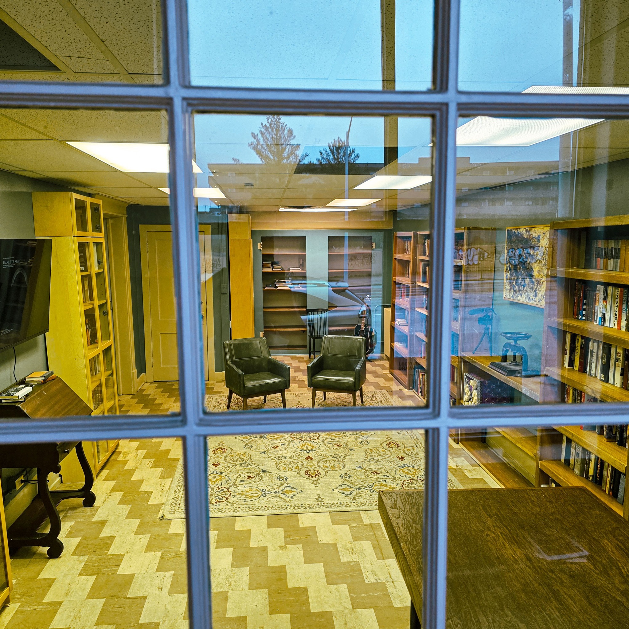 Shelves and objects inside Commonwealth Reading Room at Erie Labor Temple.
