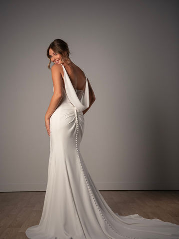 Low back minimalist wedding dress in San Antonio bridal shop