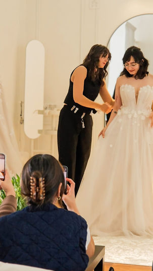 Beautiful bride in wedding dress shop in San Antonio, TX.