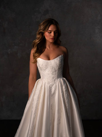Strapless corset wedding dress, available at Bridal Galleria of Texas in San Antonio. Perfect for brides searching for bridal shops near me.
