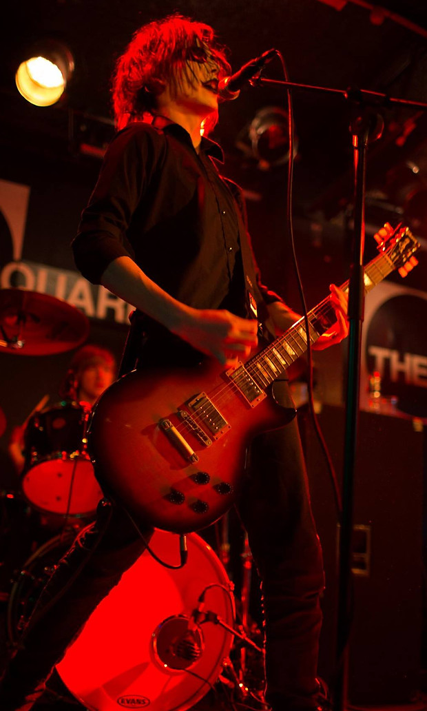Man Playing Guitar
