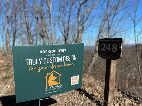 Picture of a sign that says "Truly Custom Design For Your Dream Home" Reynard Custom Homes in North Georgia for architectural design