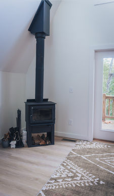 In the serene Blue Ridge Mountains of North Carolina, Wayah Cove is more than just a cabin—it's a sanctuary. This distinctive A-Frame style retreat, built in 2023 in Franklin, NC, offers a charming and secluded getaway.

​

Boasting over 1,200 square feet with two bedrooms and two baths, the custom-designed home was purposefully created as a haven for peace, healing, and rejuvenation. While now a cherished vacation spot, Wayah Cove holds a deeply meaningful history: it was originally intended as a hospice location to honor the final days of a beloved family member, and its current purpose as a retreat continues to celebrate her memory.