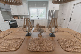 'Right-sized' coastal living is perfectly balanced in this beach getaway in Port St. Joe, Florida. Designed by architect James Knight of Reynard Custom Homes, this home is proof that sometimes the best vacations are the simplest.

Spanning 1,298 heated square feet, the 2-bedroom, 2-bathroom layout is meticulously planned for comfort and style on a 0.3-acre lot. Every detail, beautifully captured by Kalyn Kight photography, showcases a perfect blend of high-end custom craftsmanship and relaxed beach house charm.