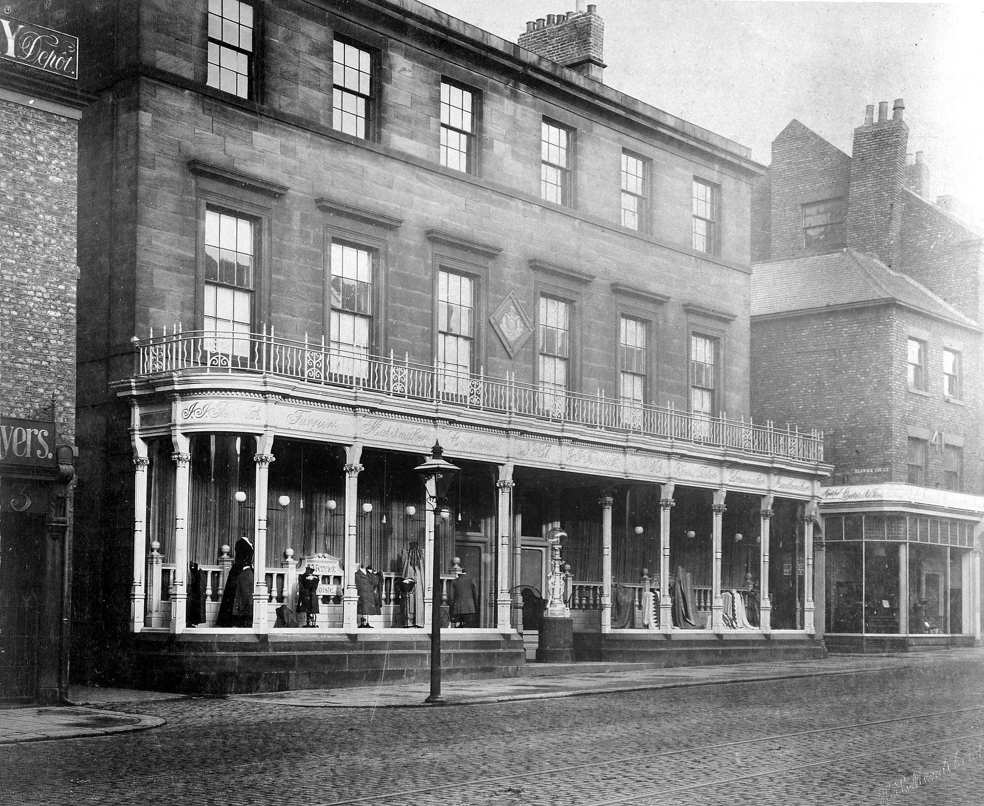 Curved glass and intricate metalwork in Fenwick Newcastle shopfront, late 1880’s