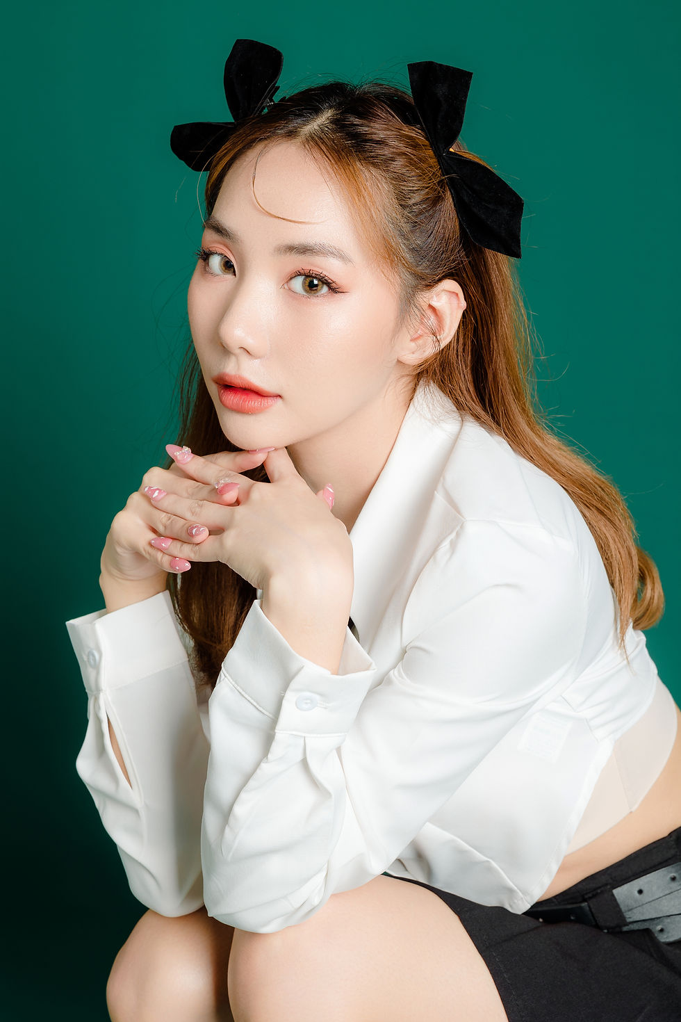 portrait-pretty-joyful-teenage-asian-student-woman-white-shirt-black-short-skirt-with-slim