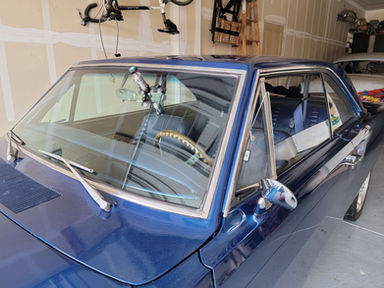 Rock chip repair on classic car windshield in Golden