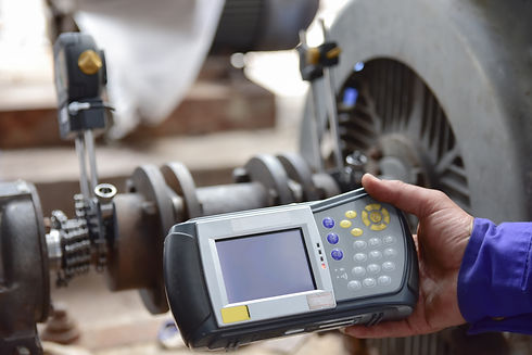 Technician aligning shaft with Laser Sha