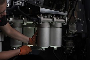 Low key photo of hydraulic pipes mainten