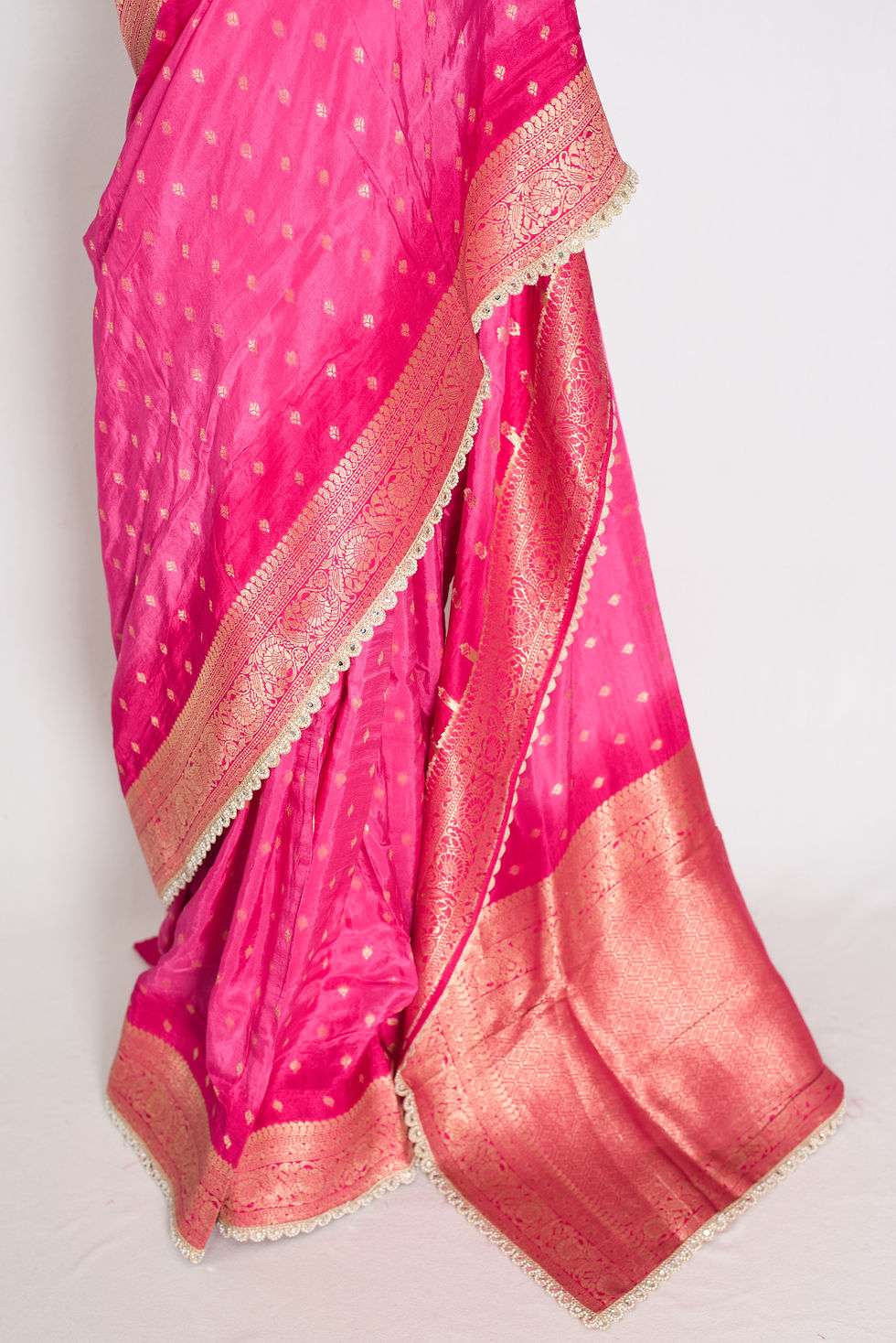 Thumbnail: Front view of the pink and gold Dola silk Banarasi saree draped on a mannequin.