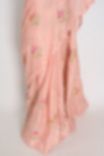 Thumbnail: Pastel peach Kota silk saree styled elegantly on a mannequin, showcasing its light-as-air fluid drape and floral embroidery.