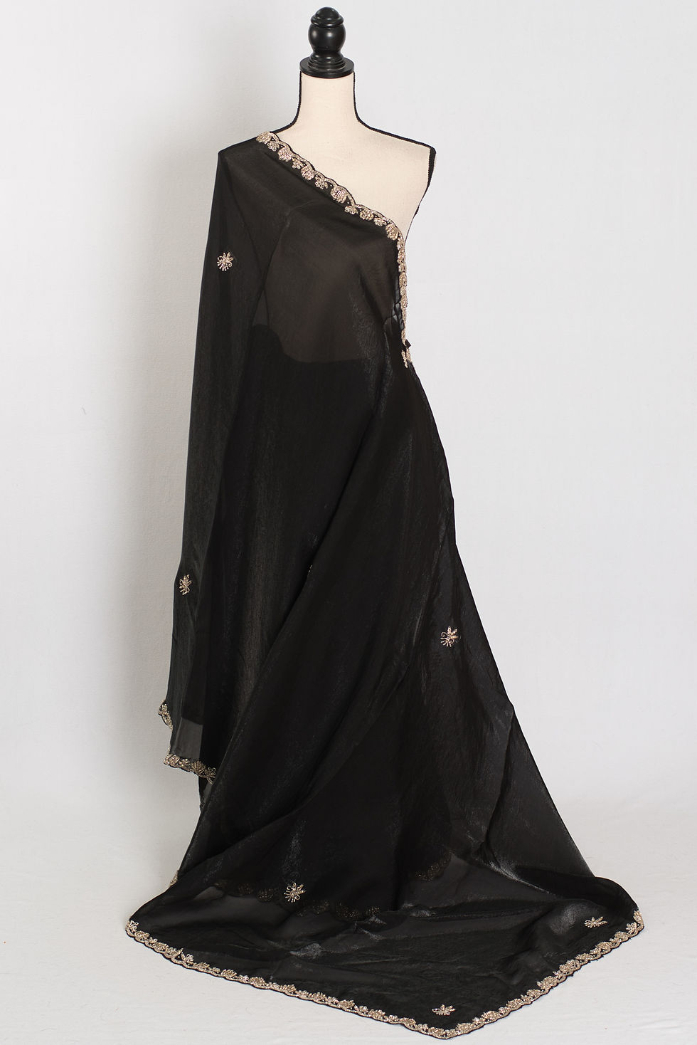 Gauri black designer partywear saree with detailed floral embroidery.
