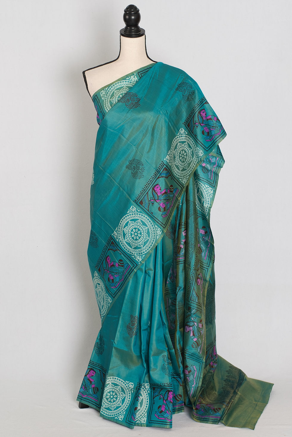 Front full-length view of the teal blue pure Bishnupur silk saree draped on a mannequin, showcasing its soft flowy fabric.