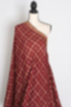 Thumbnail: maroon semi Tussar silk saree in a traditional Gharchola gold print pattern on a mannequin.