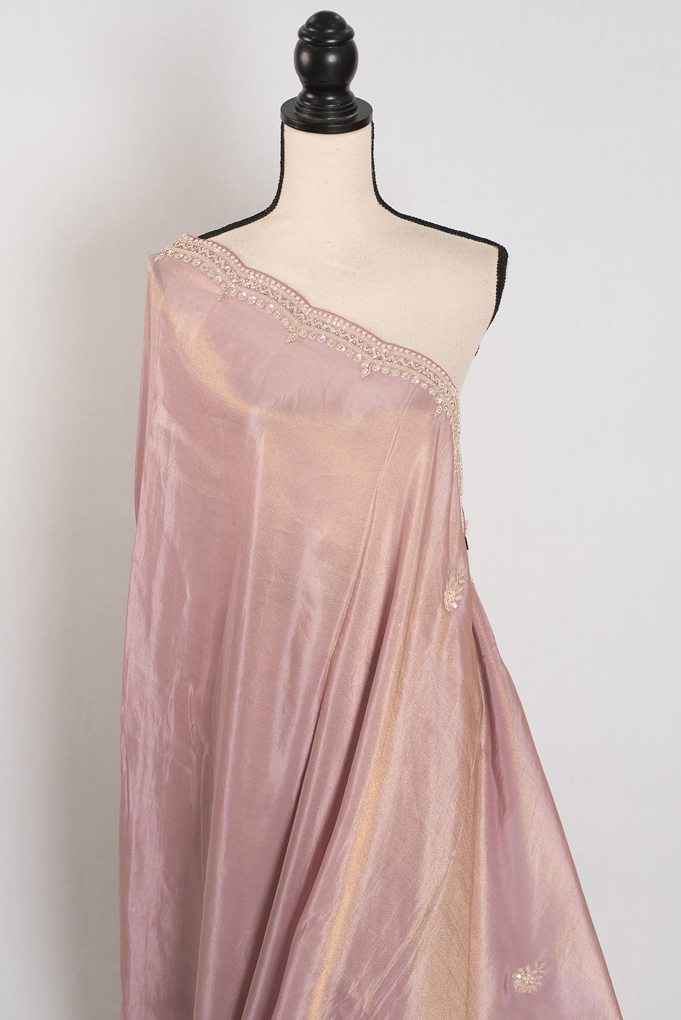 Thumbnail: Noor soft tissue silk saree in pastel mauve featuring a delicate handwork pearl border