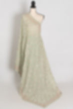 Full layout view of the sea green georgette partywear saree.