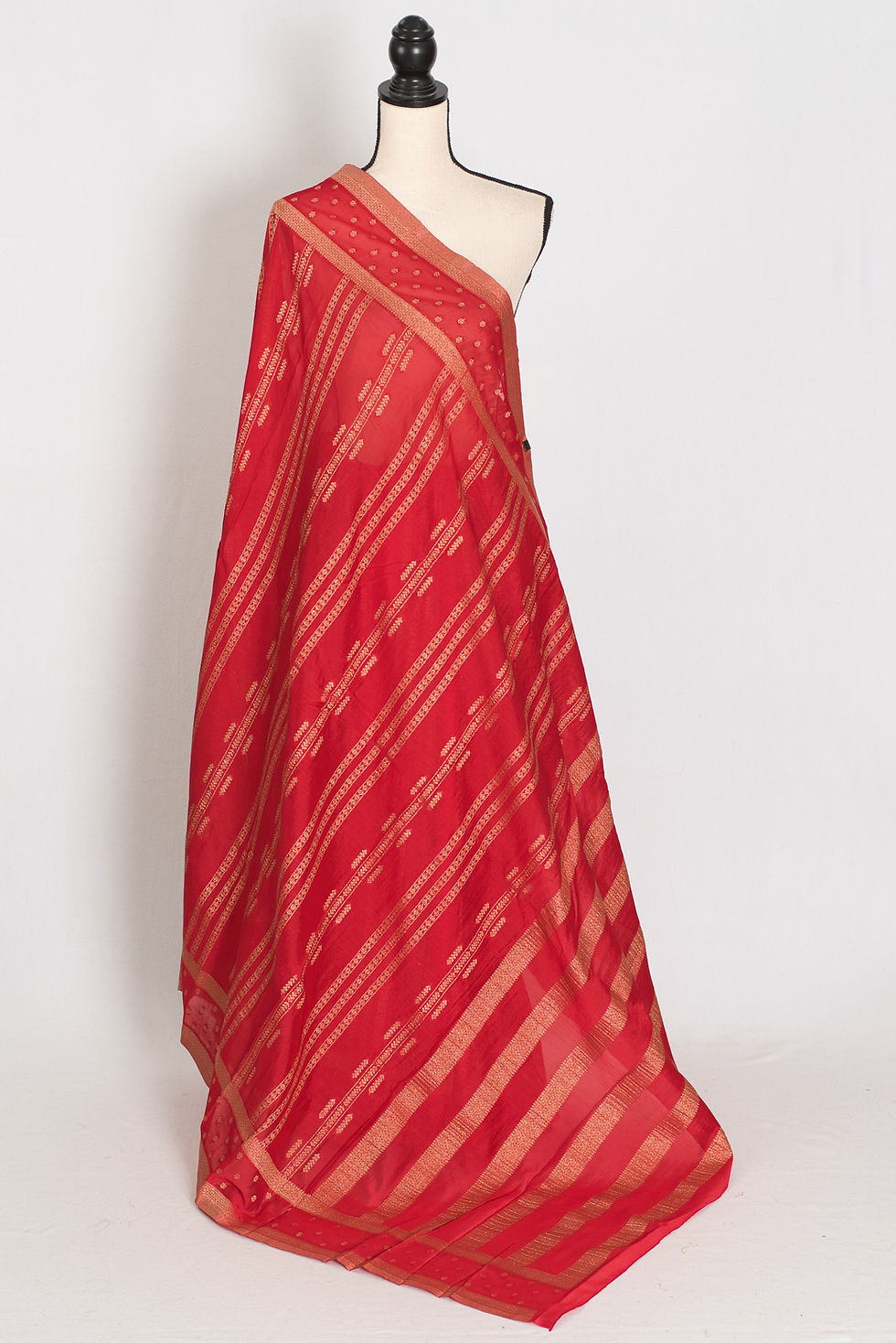 Naheed red semi georgette Banarasi saree with gold zari weaving and a fancy Bollywood-inspired lightweight drape.