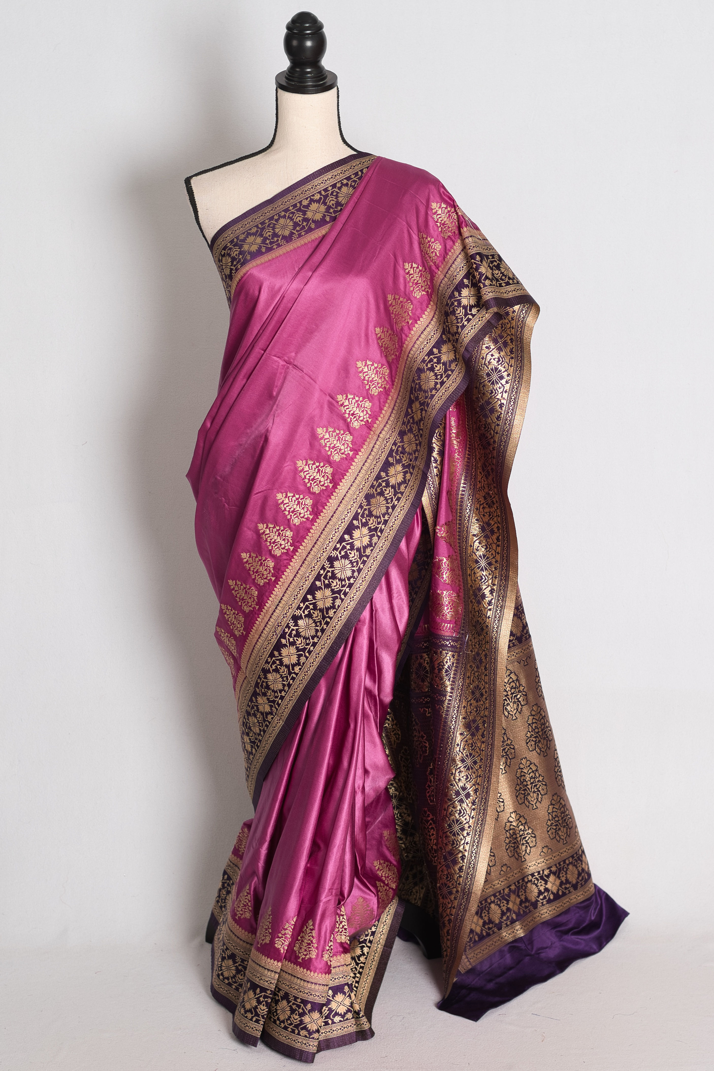 Purple Semi Mashru Banarasi Valkalam Saree draped elegantly on a mannequin showcasing its rich zari border and pallu.