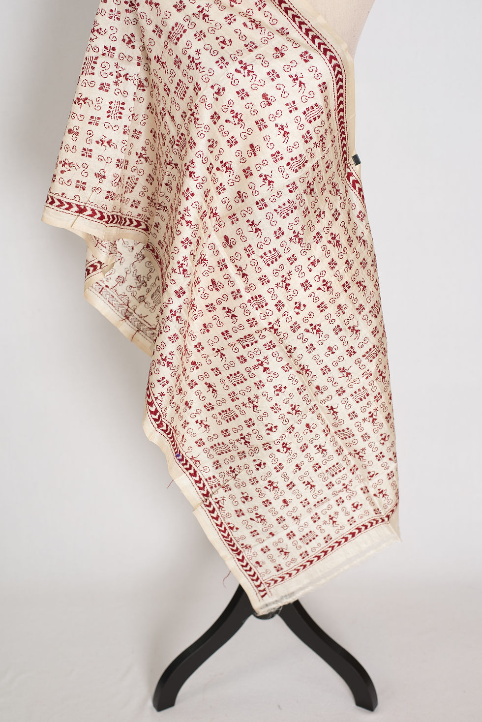 A Silk Mark Certified pure Tussar silk stole named Ankhi draped gracefully over a mannequin