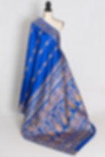 Thumbnail: Front full-length view of the vibrant royal blue and gold handwoven Swarnachari pure silk saree on a mannequin.