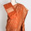 Thumbnail: Mina : Semi Satin Silk Traditional Jaal Banarasi Saree in Rust Orange and Gold