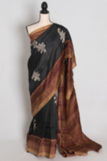 Black and brown Murshidabad pure silk saree with hand-printed off-white paisley motifs and geometric diamond borders.