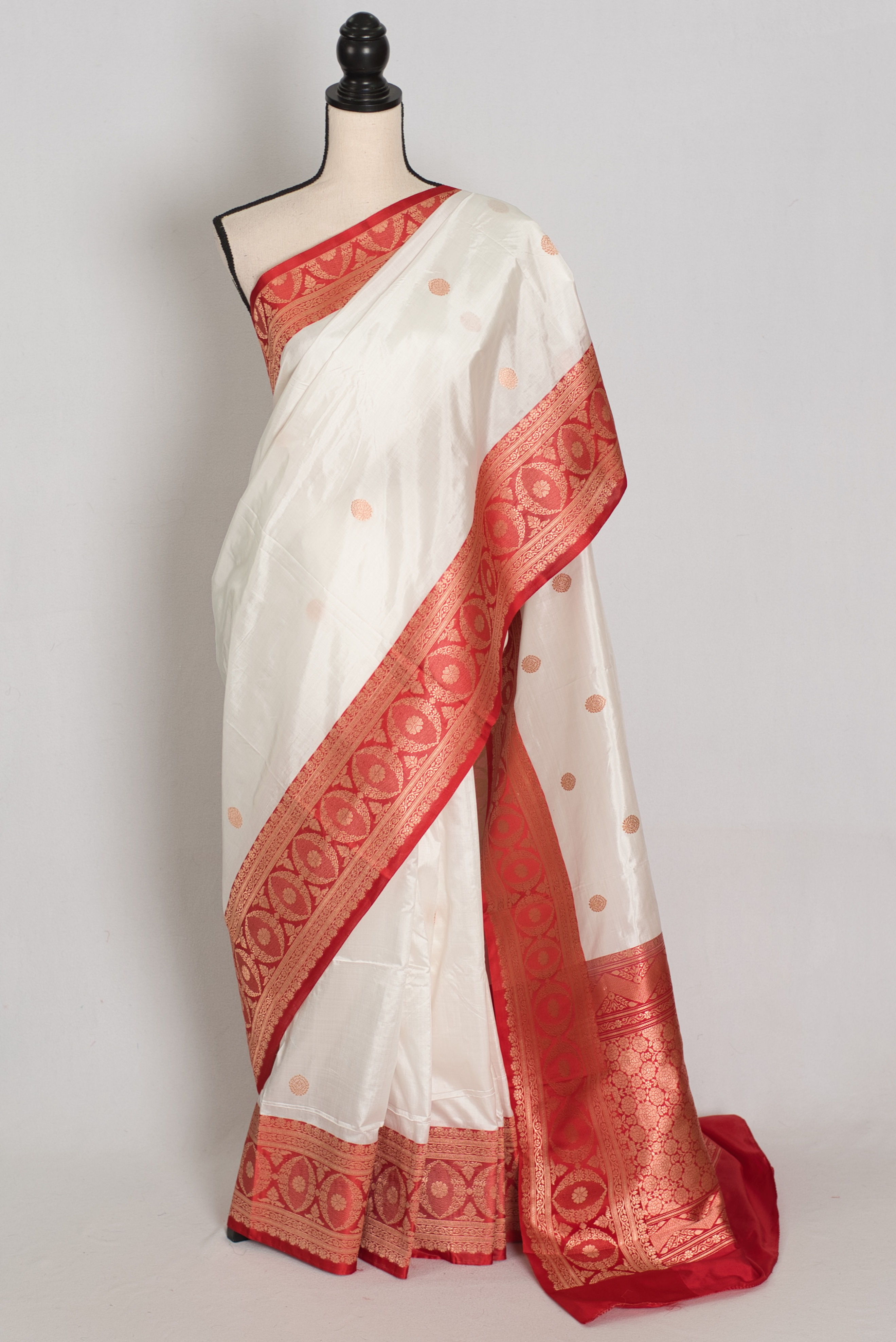 Clay white handwoven pure silk Banarasi saree with deep maroon copper zari medallion border, and matching blouse piece.