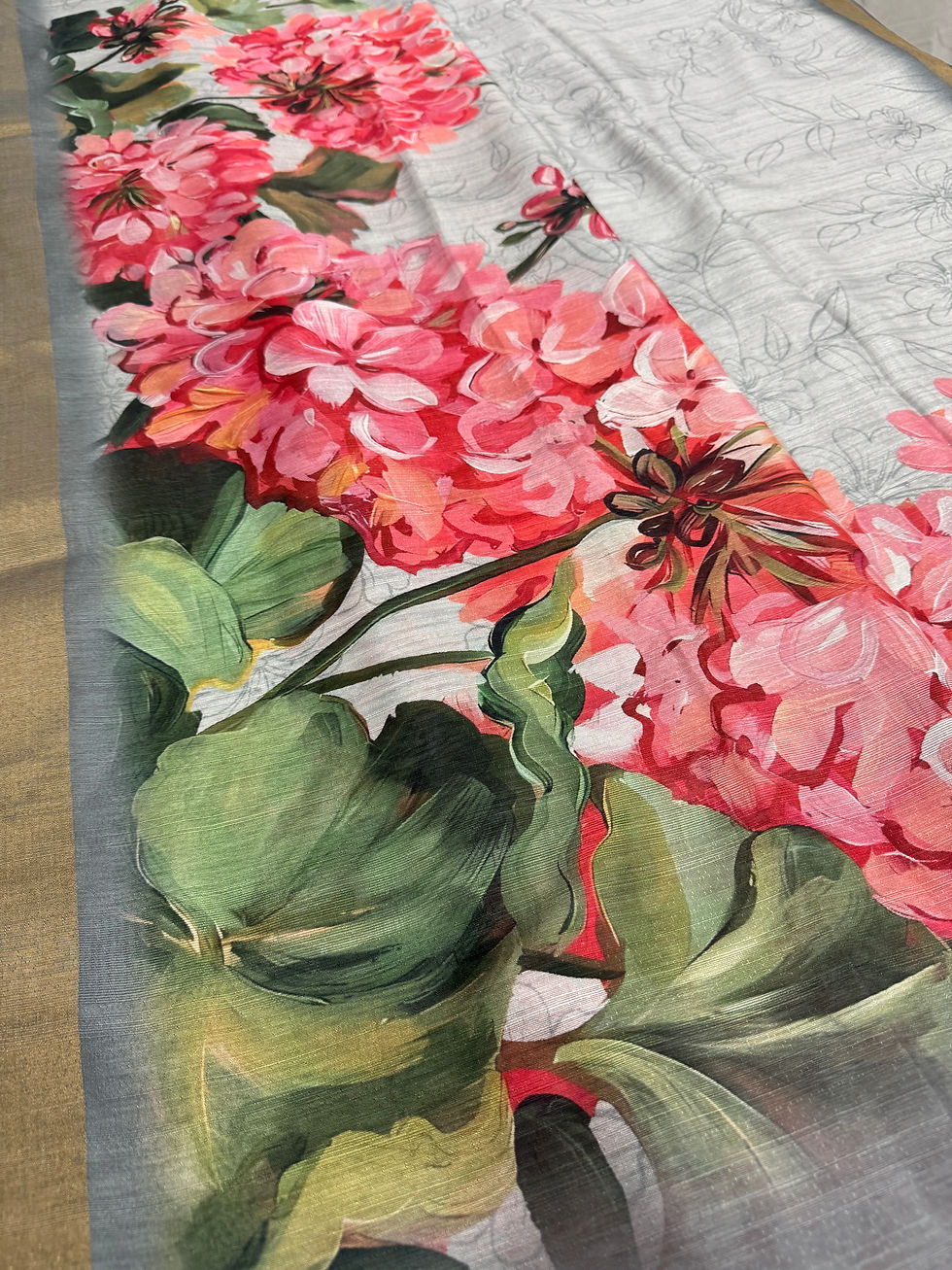 Thumbnail: Ila collection: Grey semi tussar saree with vibrant pink floral prints, botanical design, and coordinating grey blouse.