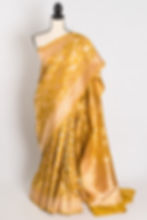 Golden yellow bridal Banarasi silk saree with gold zari motifs (Sona Collection).