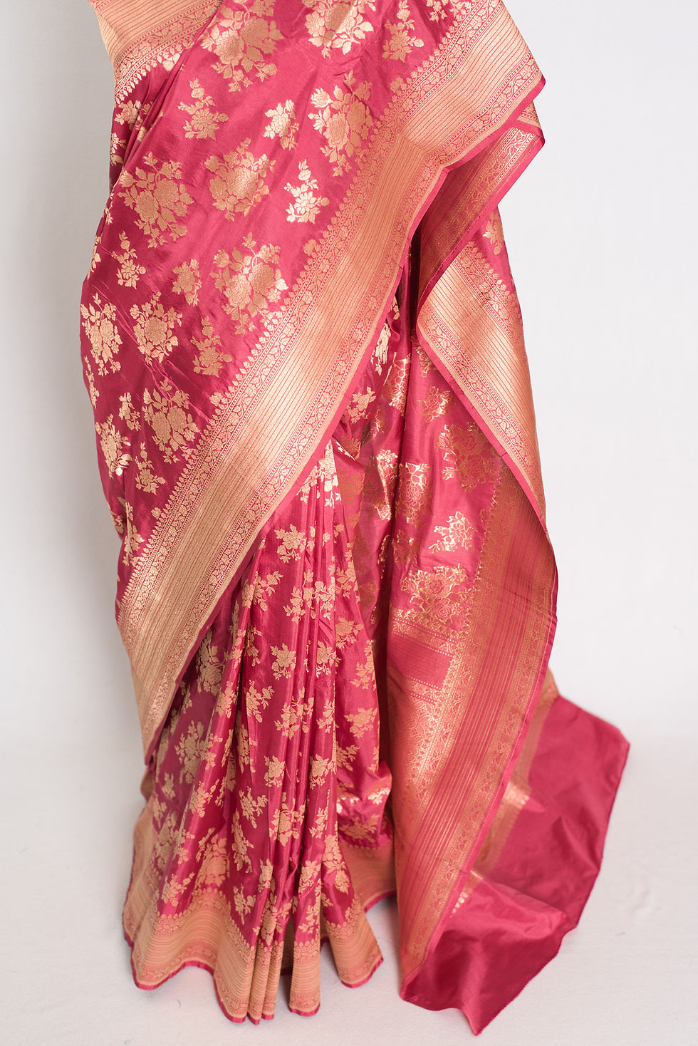 Thumbnail: Dusty pink bridal Banarasi silk saree with an all-over gold zari jaal (Mehuli).