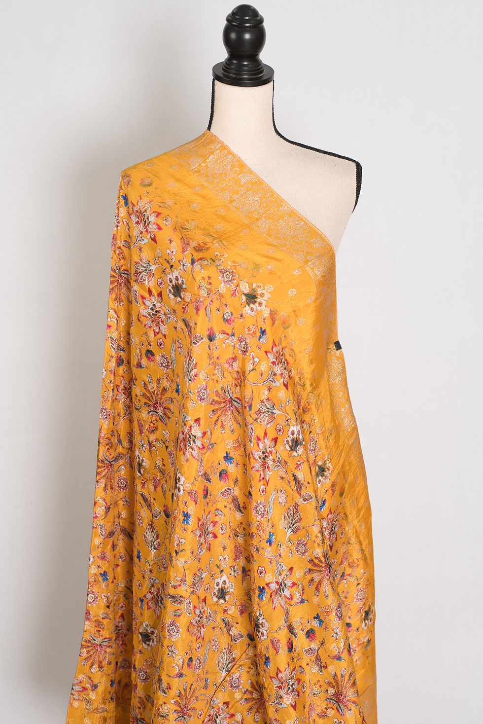 Dola Silk Banarasi dupatta in mustard yellow draped fully across a mannequin.