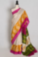 Off-white, yellow, and pink Murshidabad silk saree with hand-printed yellow paisley borders draped beautifully on a mannequin