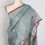Thumbnail: Grey Bengal Tussar silk saree with a red Jamdani border (Benu Collection).