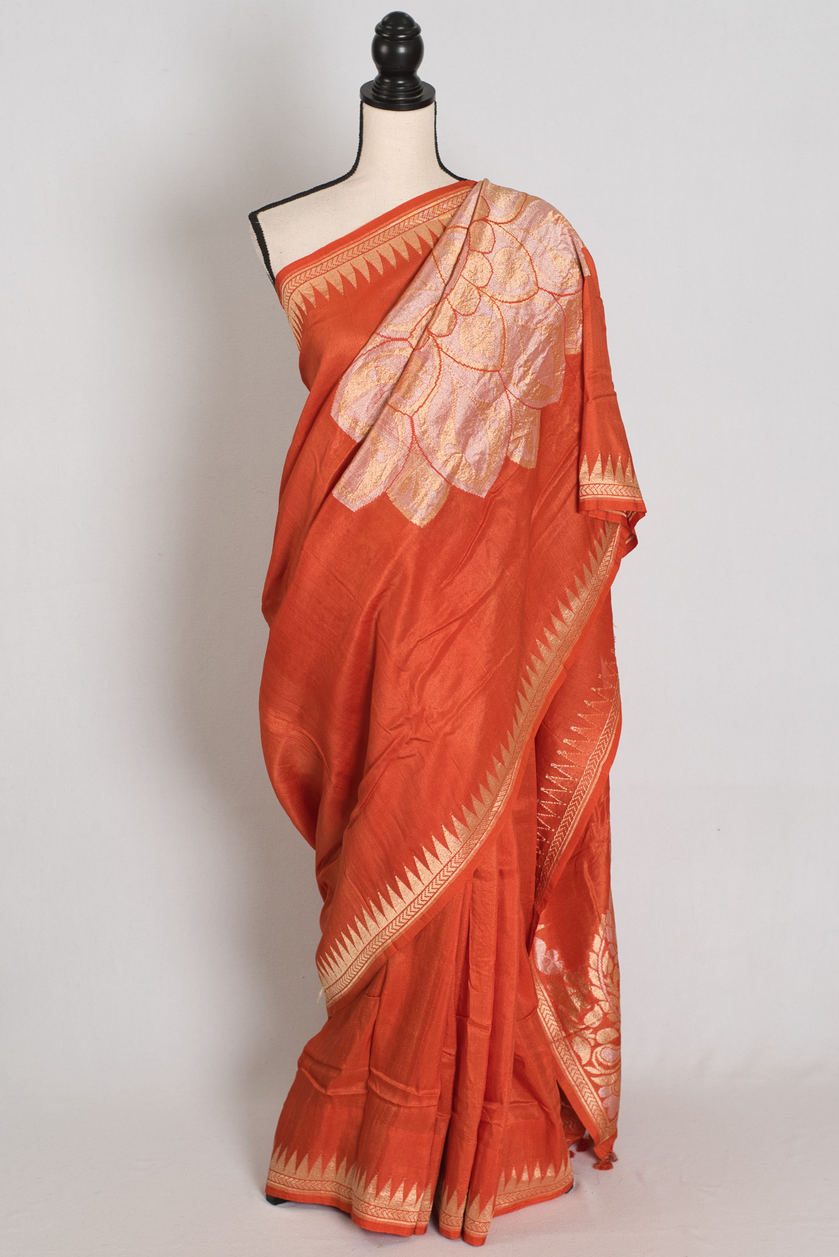 Rust orange premium Tussar Georgette Banarasi saree featuring a clean solid body.