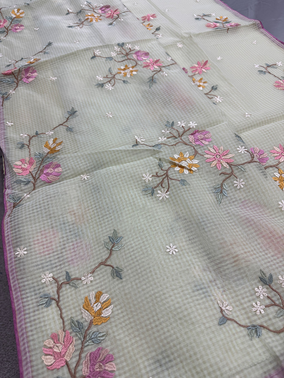 Thumbnail: Ragini collection: Sea green blended cotton kota saree with pink floral machine embroidery and pink piping border.