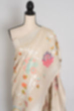 Thumbnail: Beige and silver Tussar Georgette Banarasi saree with pink, green, and orange Minakari floral motifs draped in a mannequin.