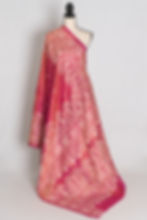 Coral pink pure Bangalore silk saree featuring hand-embroidered white Kantha stitch paisley borders draped on a mannequin.