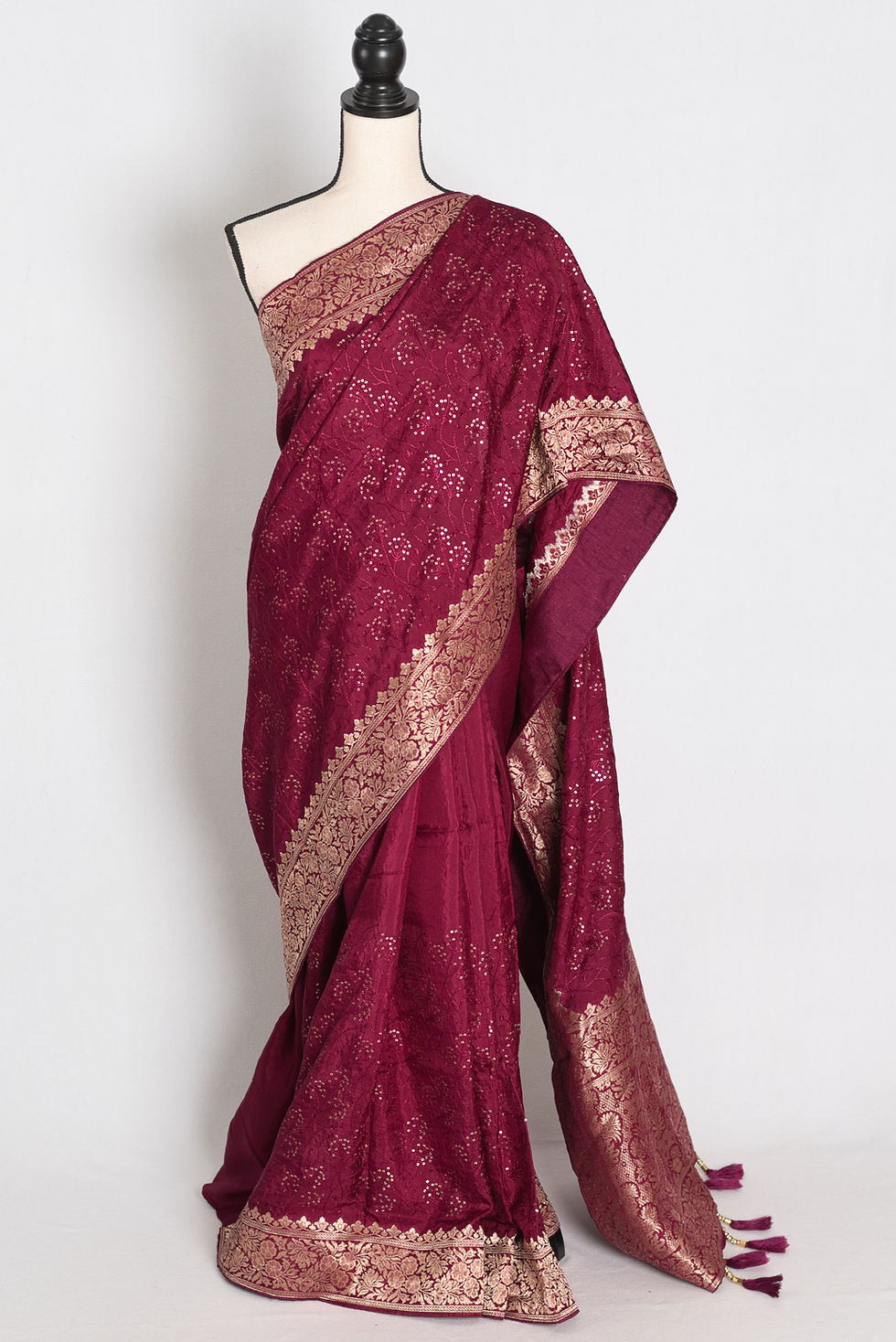 Full length view of the purple Dola silk Banarasi saree showcasing its fluid drape and gold zari border on a mannequin.