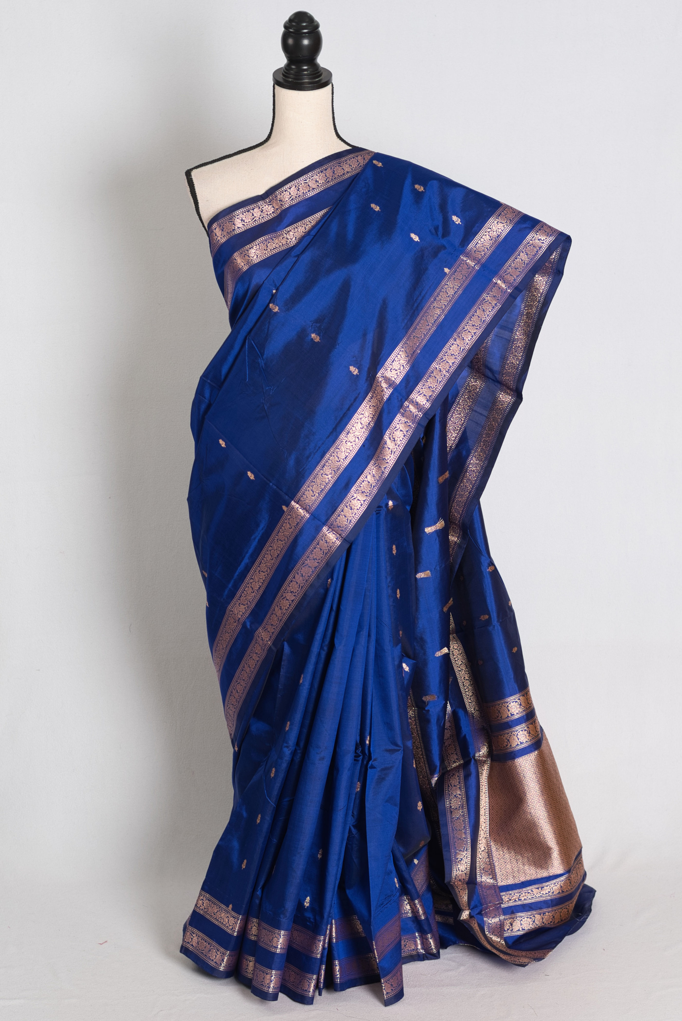 Dark blue and antique gold pure Banarasi silk saree front drape view.
