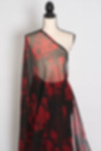 Thumbnail: full length front view of Mita black and red rose print chiffon saree draped smoothly on a mannequin.