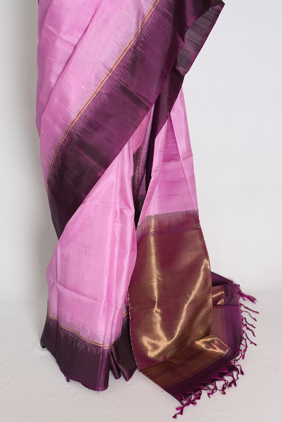 Thumbnail: Lilac lightweight Kanjivaram silk saree featuring fine gold zari dashes, a solid deep purple border, copper-gold pallu.