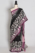 Black and gray semi silk saree featuring hand-embroidered white Kantha stitch draped on a mannequin.
