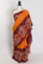 Orange and red Mulmul cotton saree with intricate Batik wax-resist prints (Trina Collection).