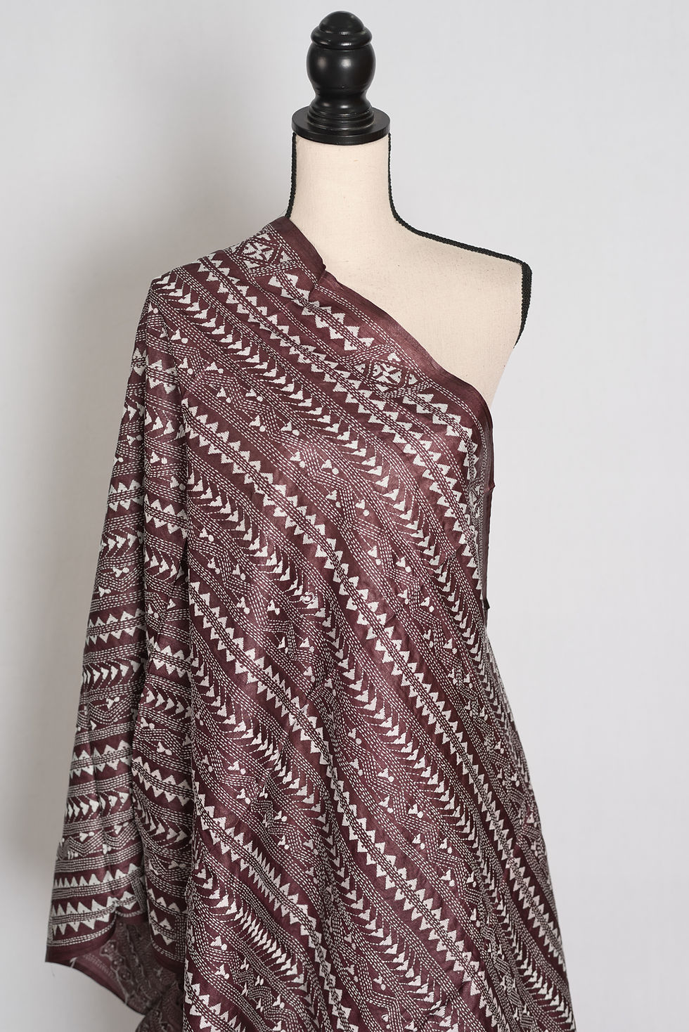 Medium view showing fine white running-stitch diagonal chevron Kantha embroidery on dark chocolate brown Tussar silk.