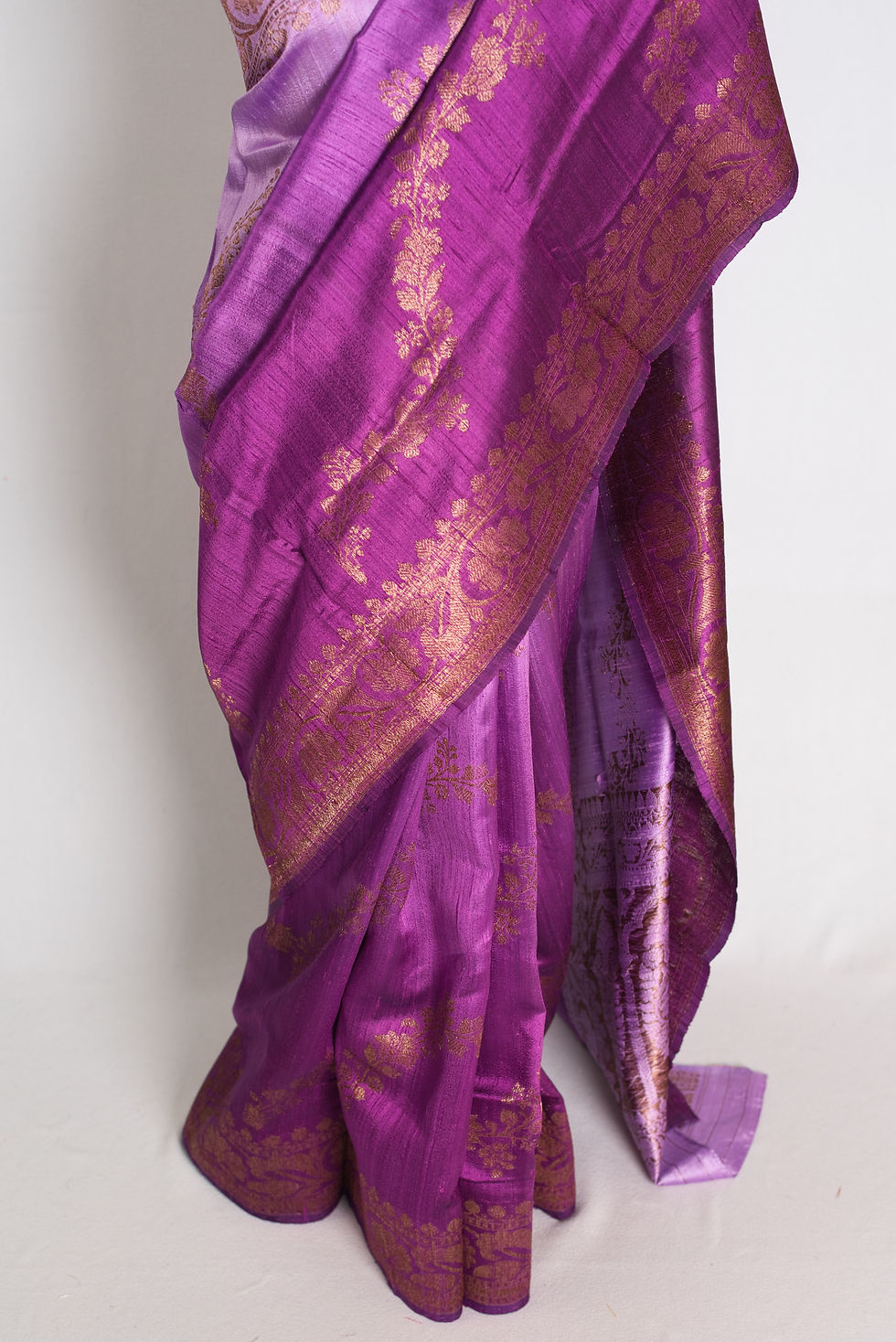 Thumbnail: Mauve and purple ombre raw silk handloom Banarasi saree with antique golden zari diagonal floral vines.