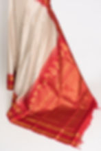 Thumbnail: Mira white and brown micro-check Gadwal silk saree with a rich red and gold zari border.