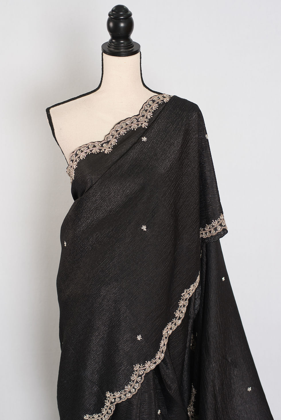 Thumbnail: Sunayna black crush tissue silk saree with a shimmering textured finish; lightweight Bollywood style designer partywear saree