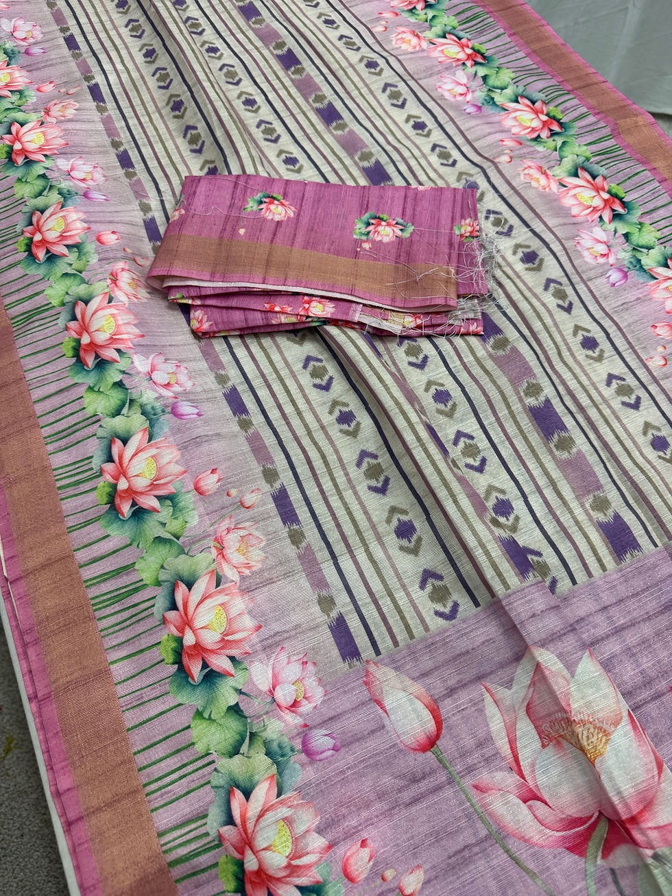 Off white and lavender semi tussar saree featuring lotus prints and ikkat patterns, with matching lavender blouse.