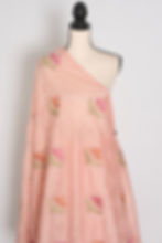 Thumbnail: Pastel peach Kota silk saree styled elegantly on a mannequin, showcasing its light-as-air fluid drape and floral embroidery.