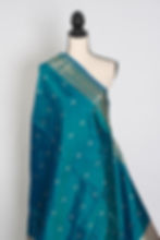 Thumbnail: Peacock green pure katan silk Banarasi saree with gold zari floral motifs and Silk Mark certification.